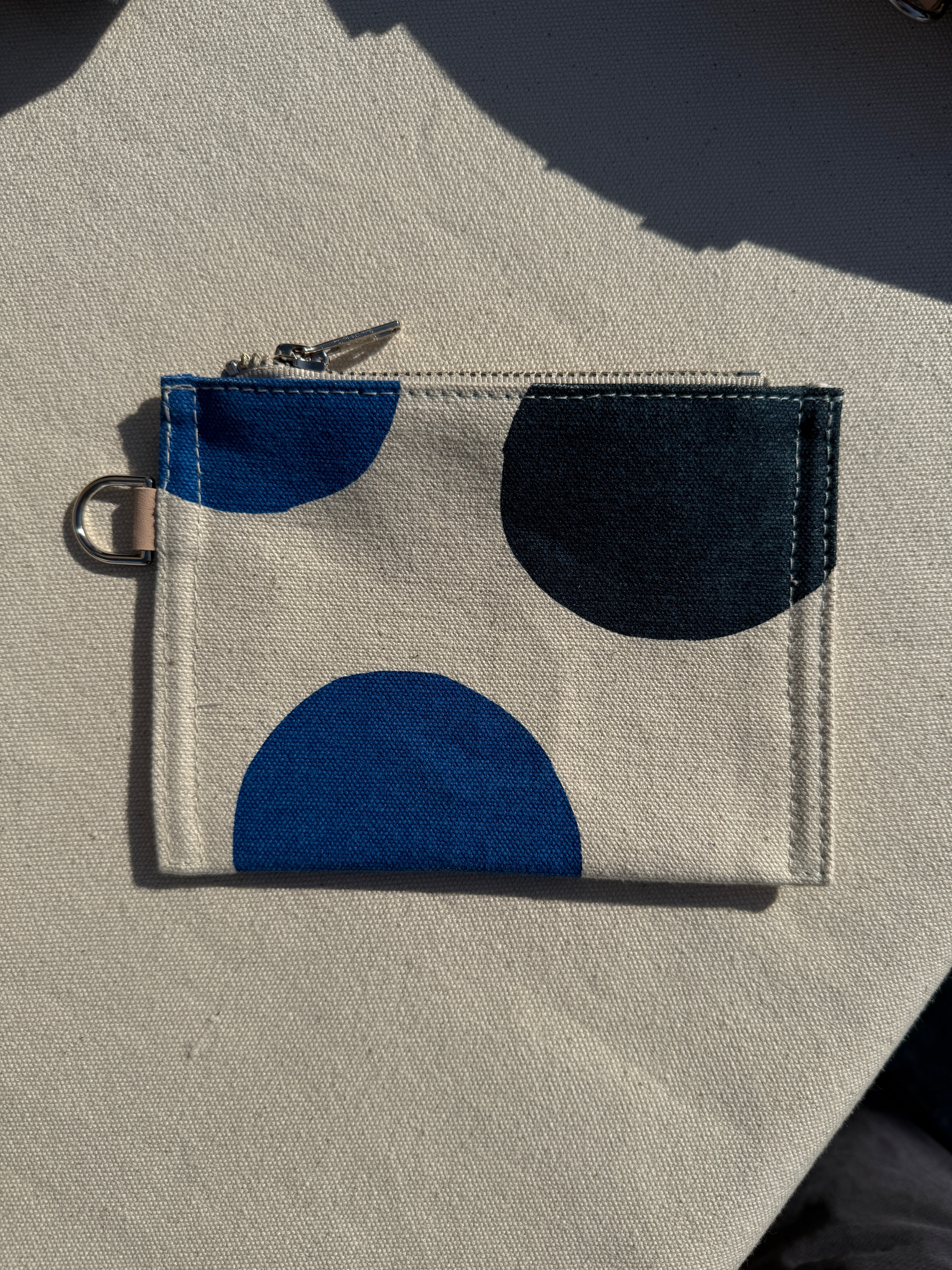 The reclaimed canvas small flat pouch in natural canvas