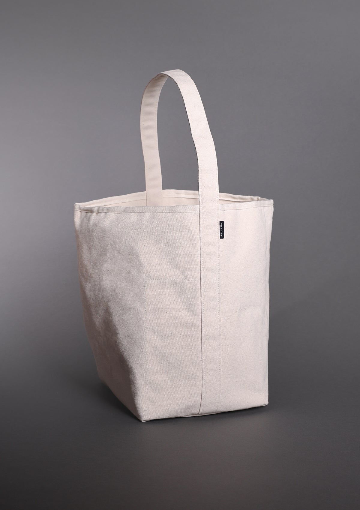 The Grand Reversible Bucket Canvas Tote