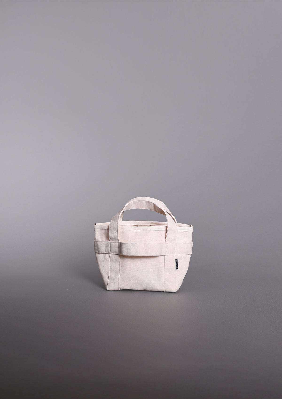 The Crossbody Mini Canvas Tote