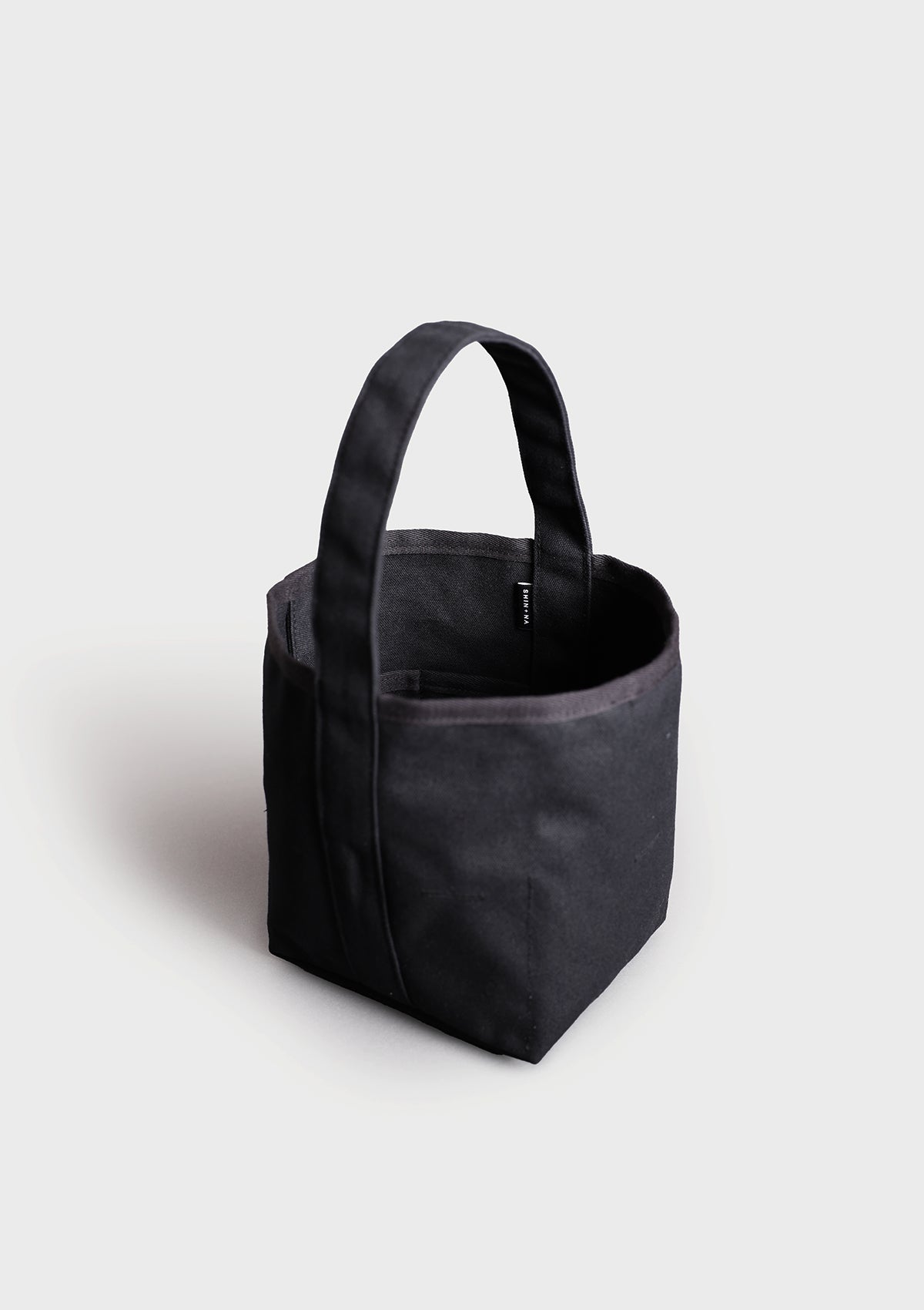 The Small Reversible Bucket Canvas Tote