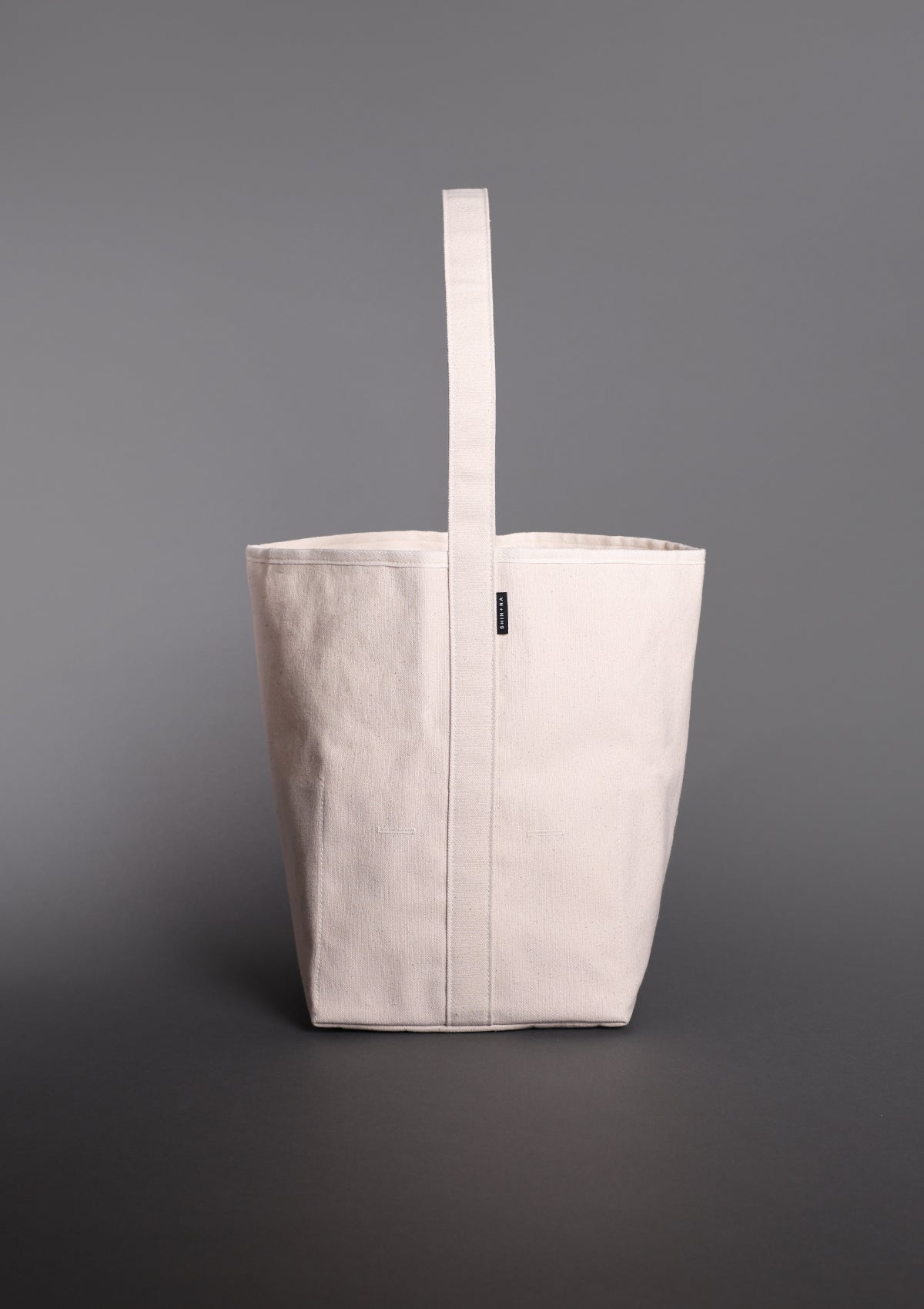The Tall Reversible Bucket Canvas Tote