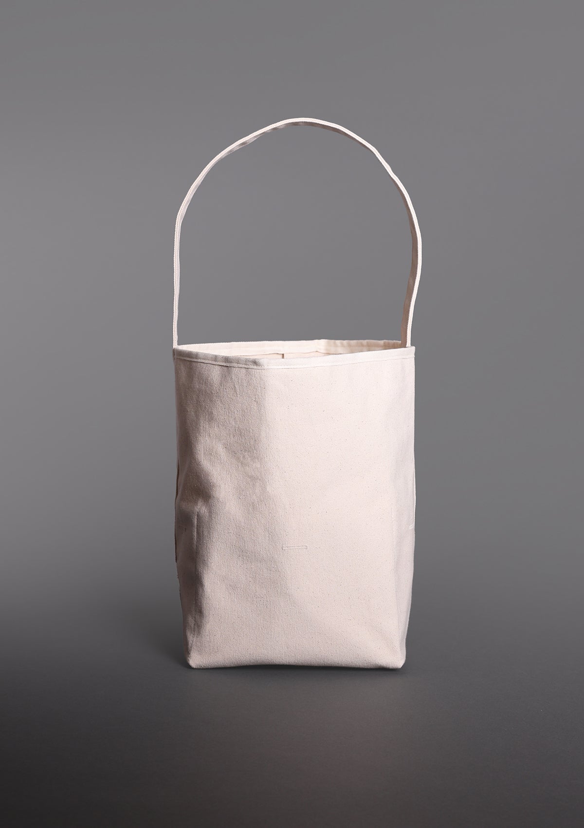 The Tall Reversible Bucket Canvas Tote