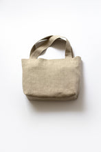 Load image into Gallery viewer, front view of revered bag. two built in pockets inside
