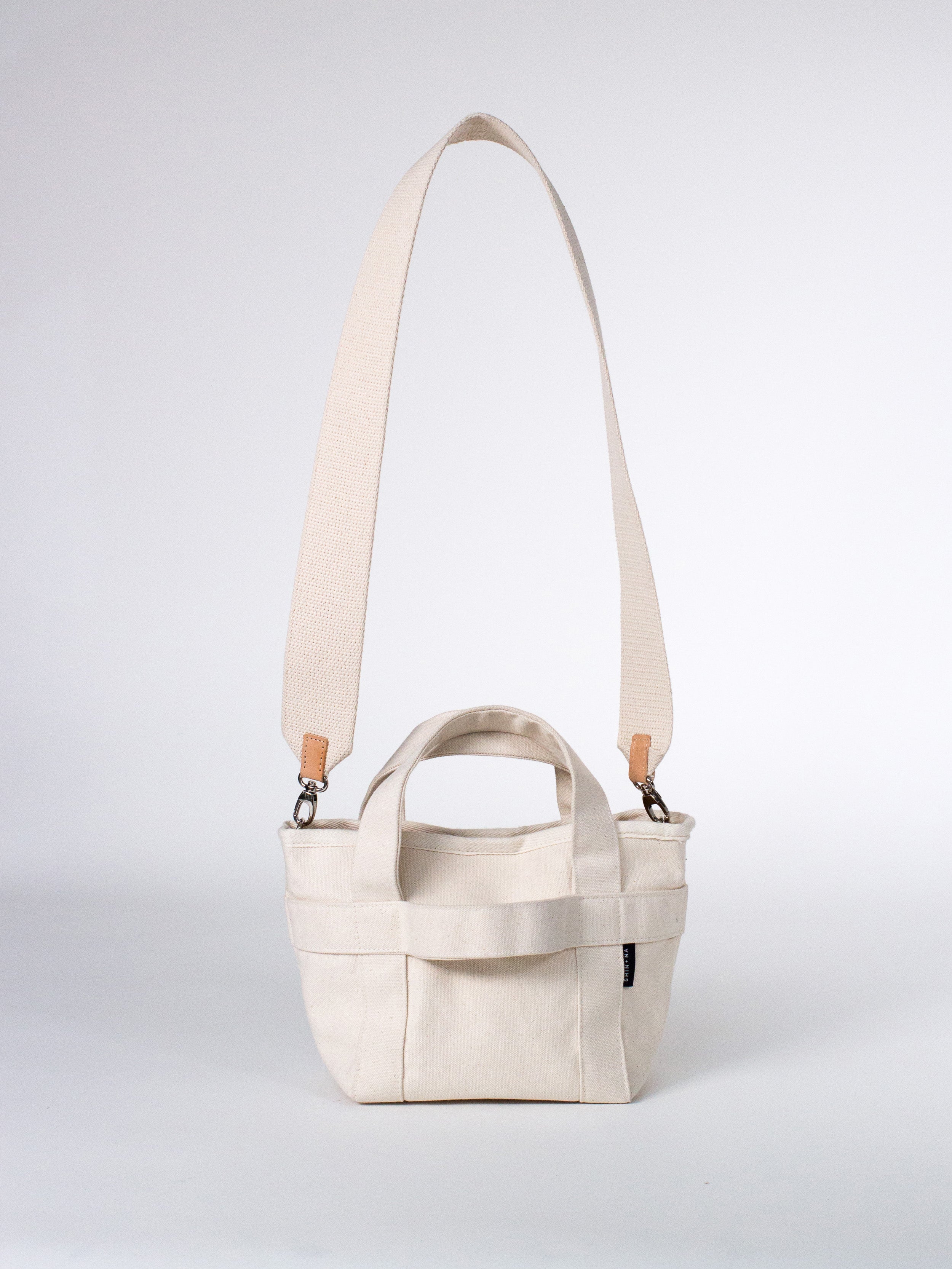 The Crossbody Mini Canvas Tote