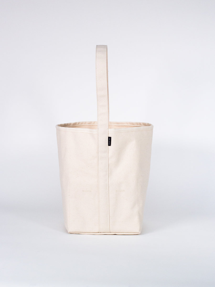 THE SMALL REVERSIBLE BUCKET CANVAS TOTE – SHIN + NA