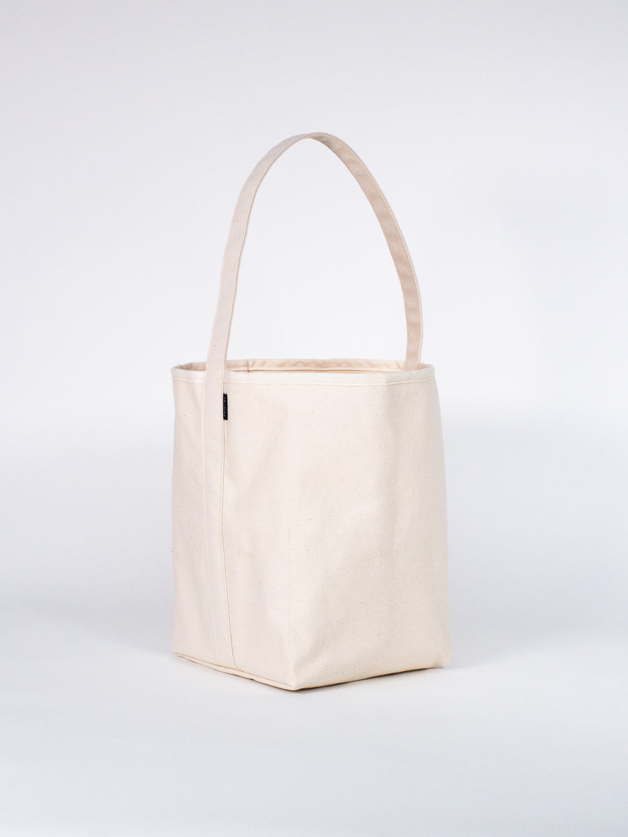 THE SMALL REVERSIBLE BUCKET CANVAS TOTE – SHIN + NA