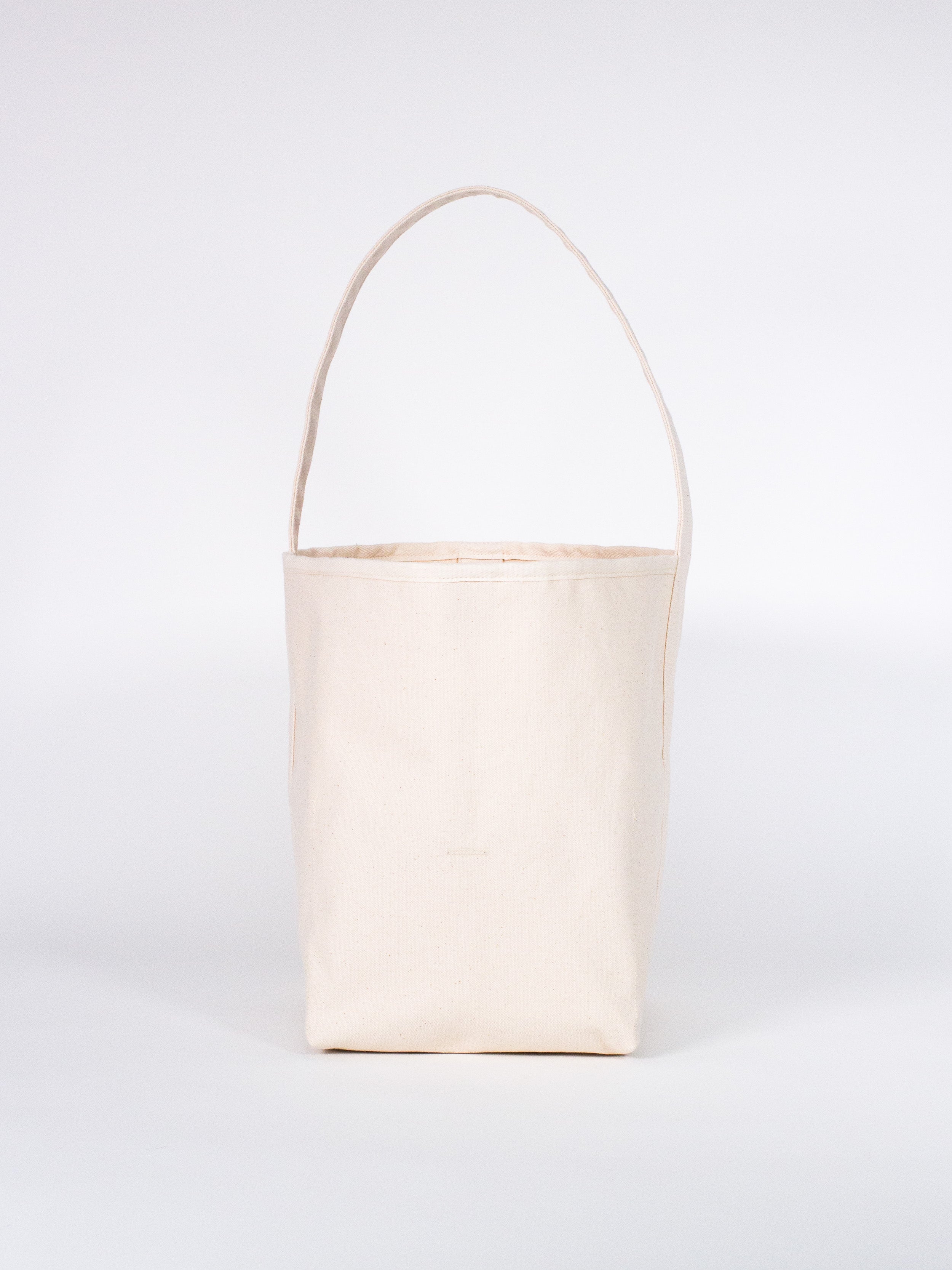 The Tall Reversible Bucket Canvas Tote