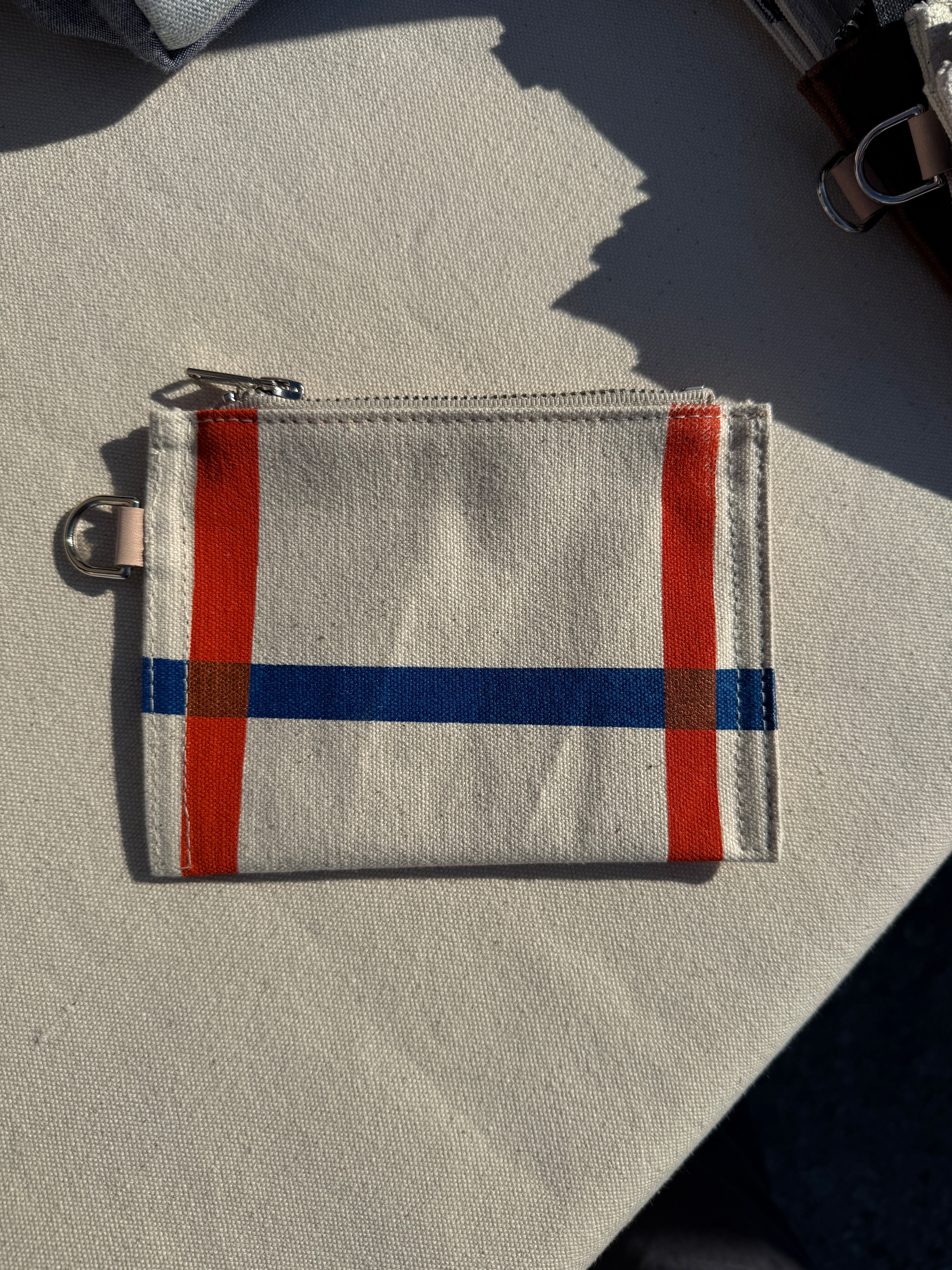 The reclaimed canvas small flat pouch in natural canvas