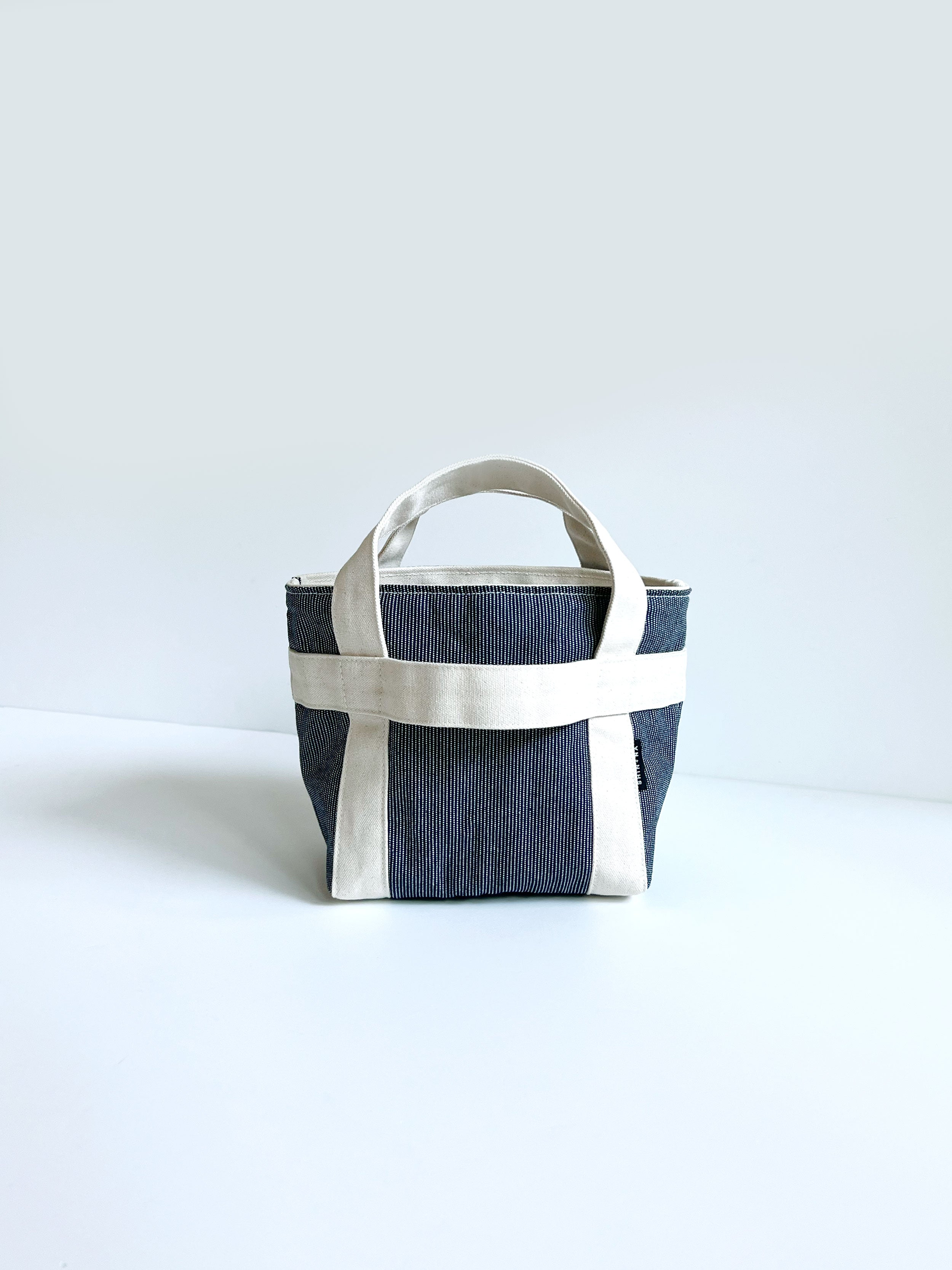 The Crossbody Mini Canvas Tote