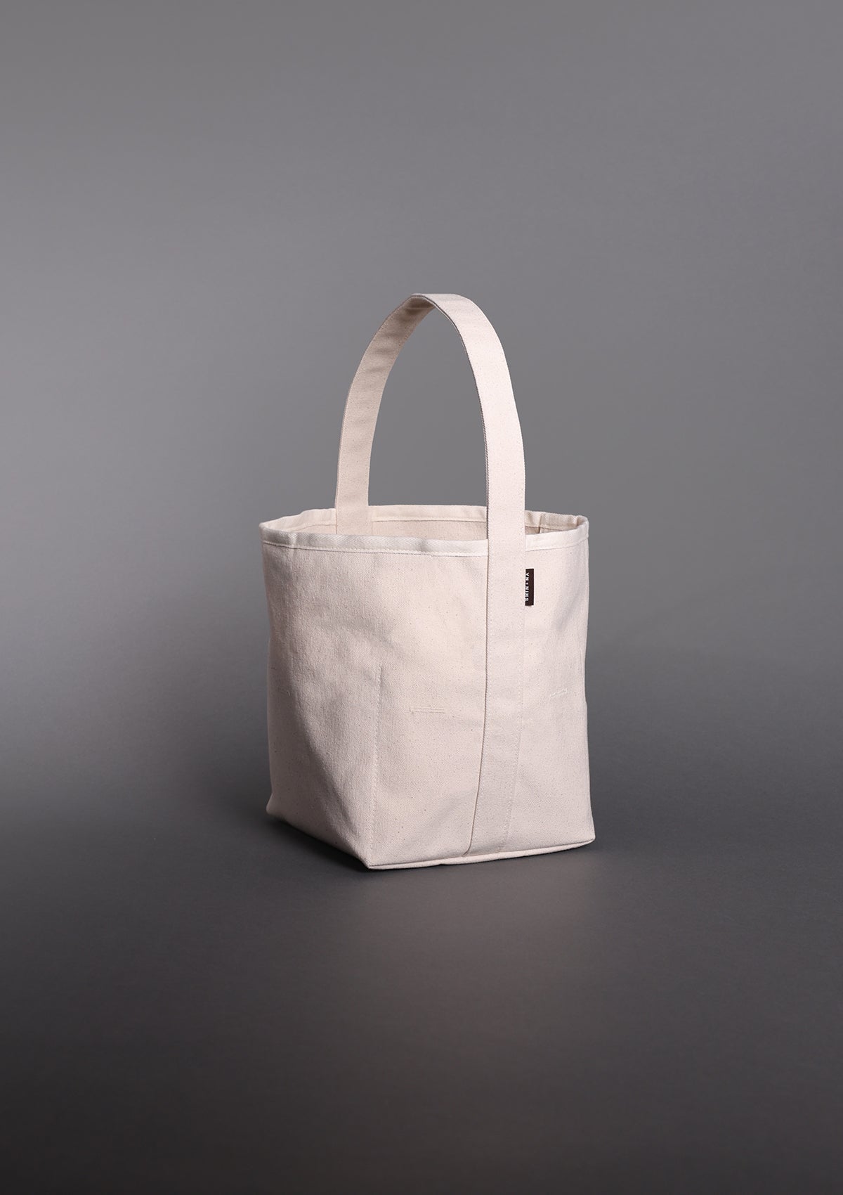 The Reversible Bucket Canvas Tote