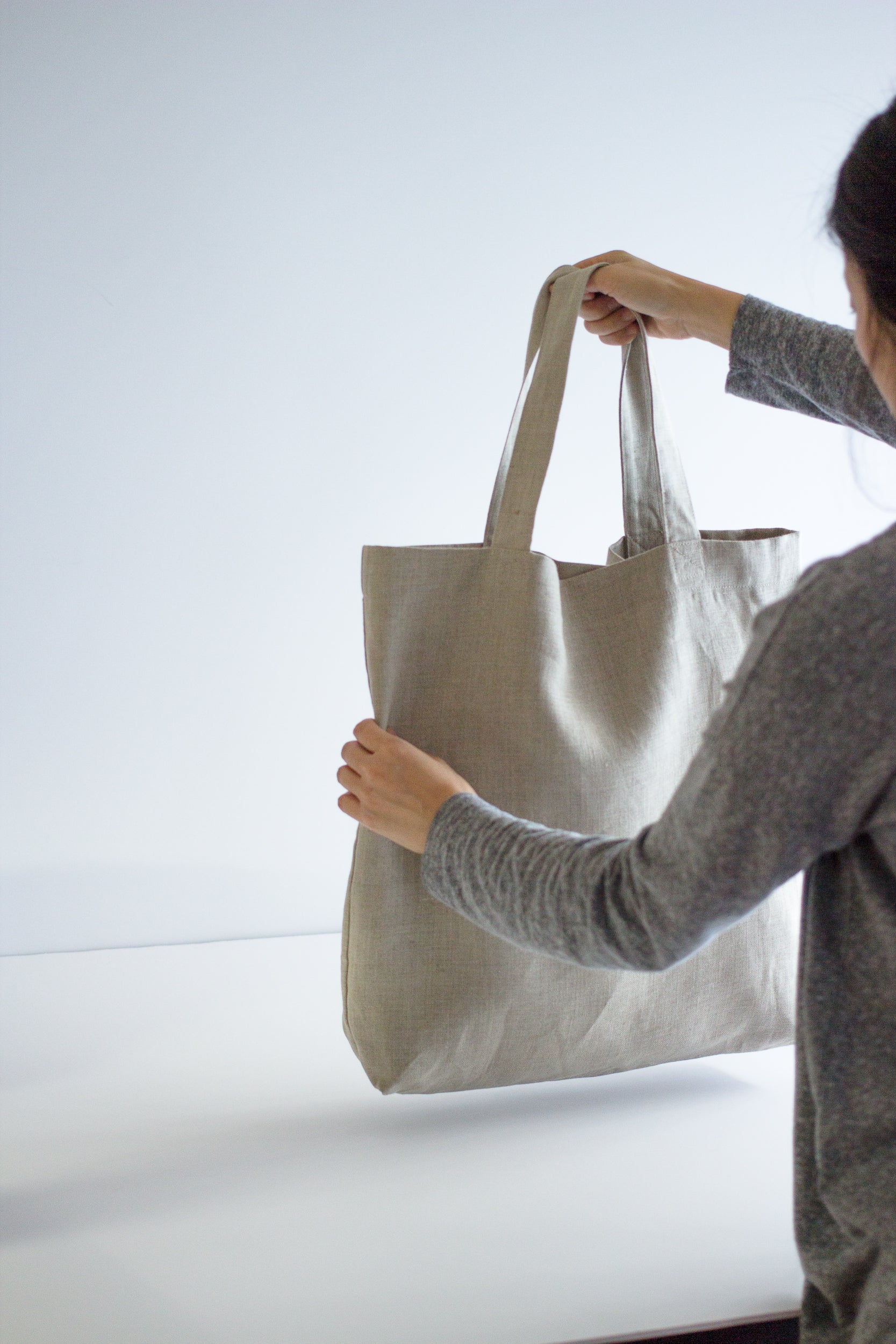 bag measurement is sixteen inch by fourteen-inch. seven-inch handle drops