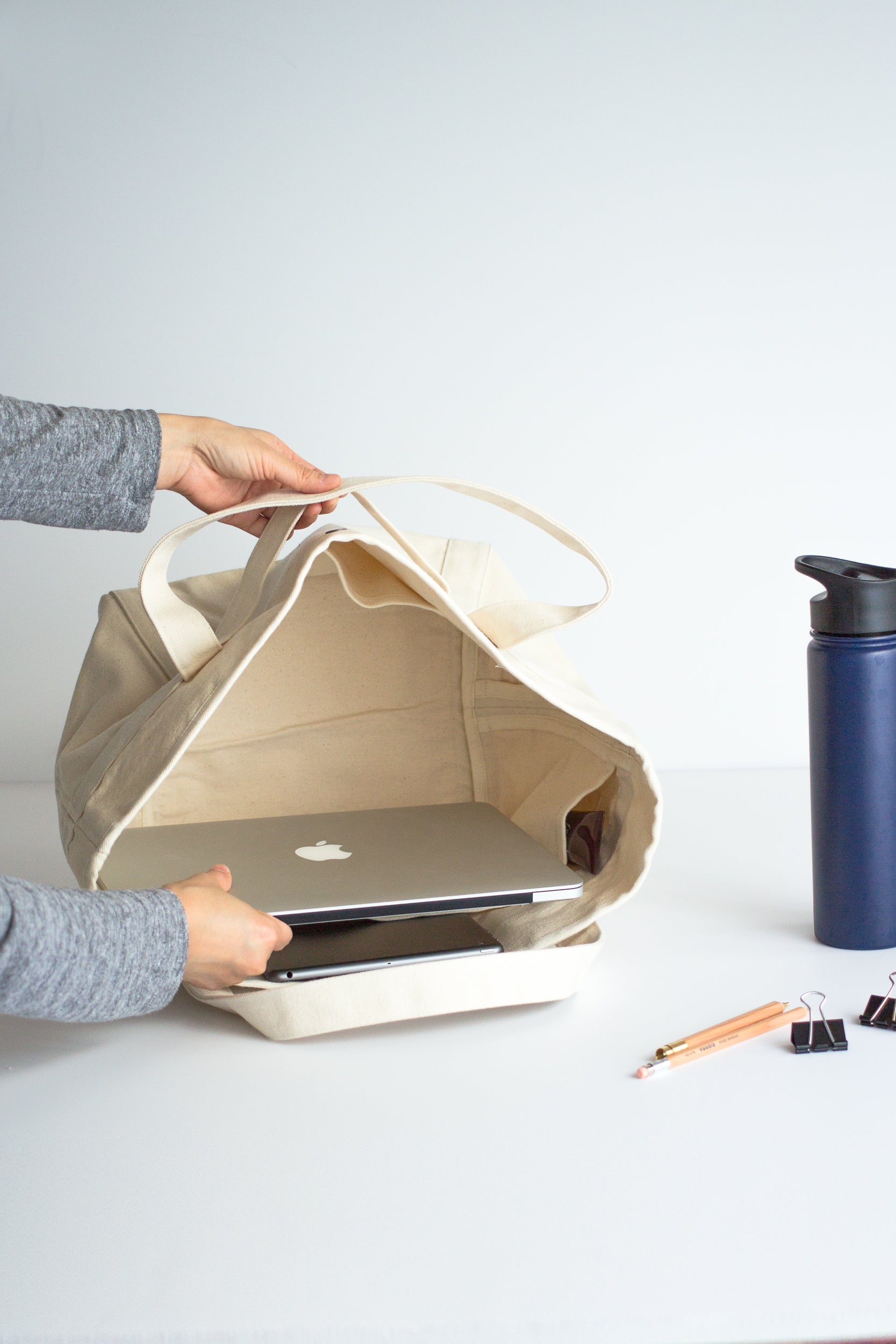 showing inside the tote and 13 inch iMac laptop