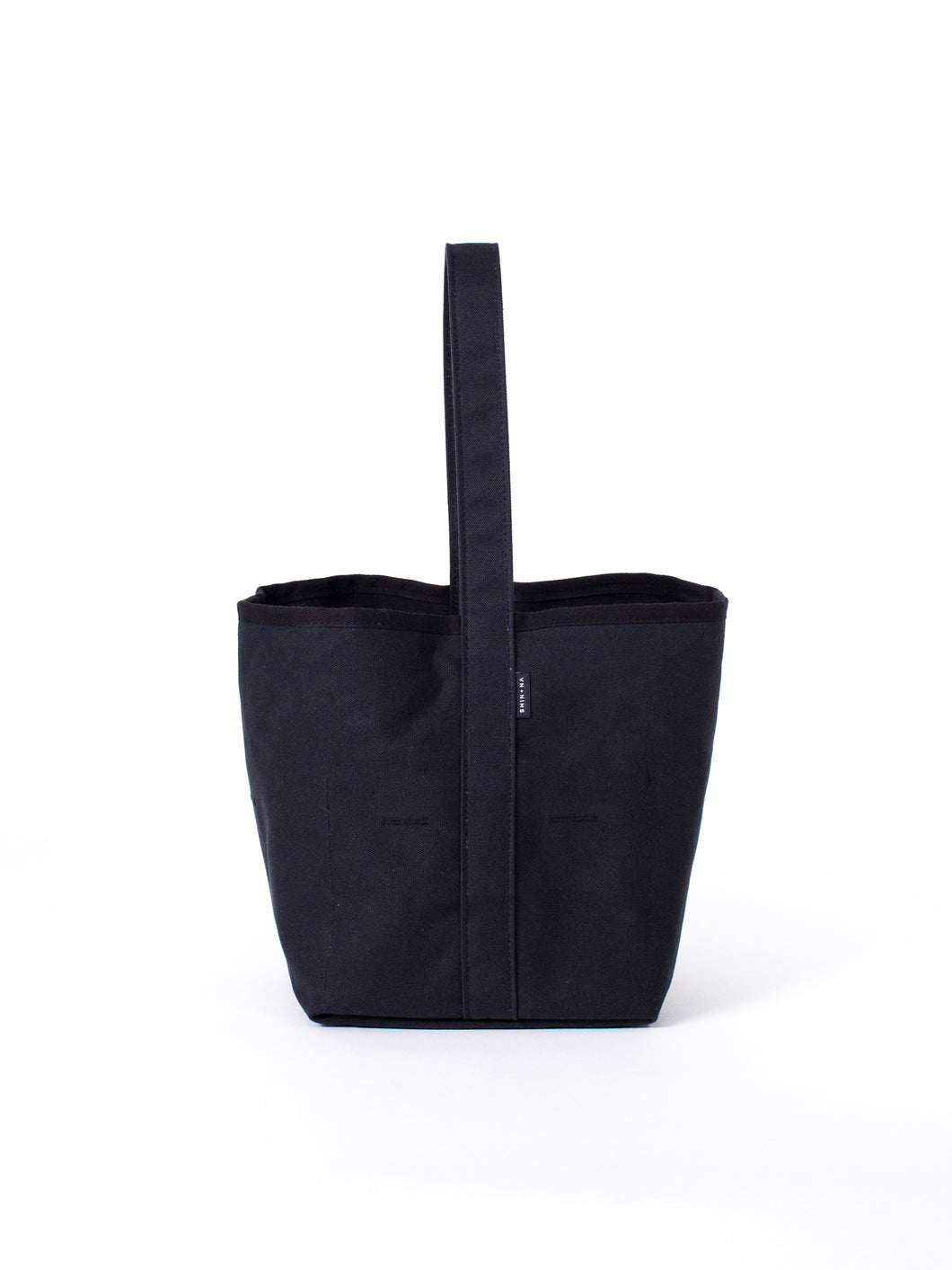 THE  REVERSIBLE BUCKET CANVAS TOTE